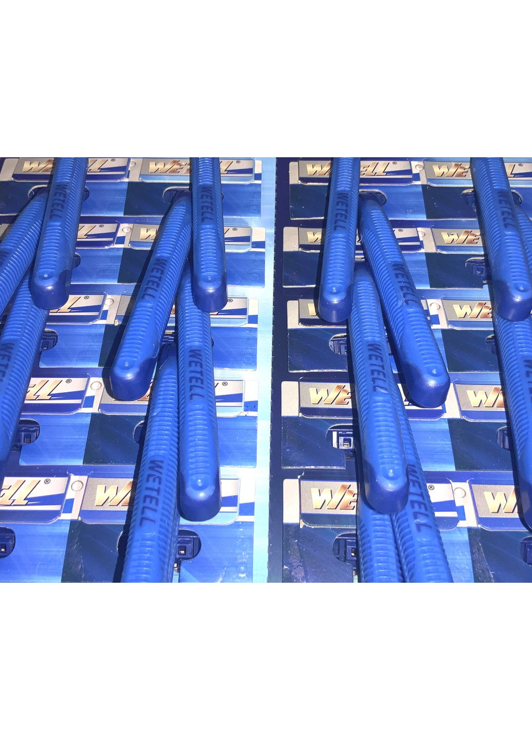 Станки для гоління одноразові пластмасові сині WETELL Comfort 24шт/11см FROM FACTORY (260742594)