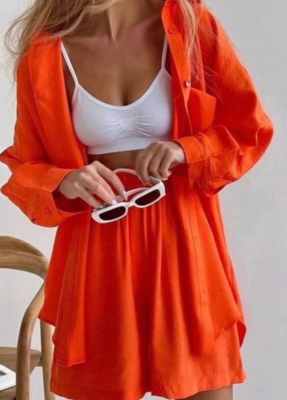 Костюм жіночий помаранчевого кольору Let's Shop (276382902)