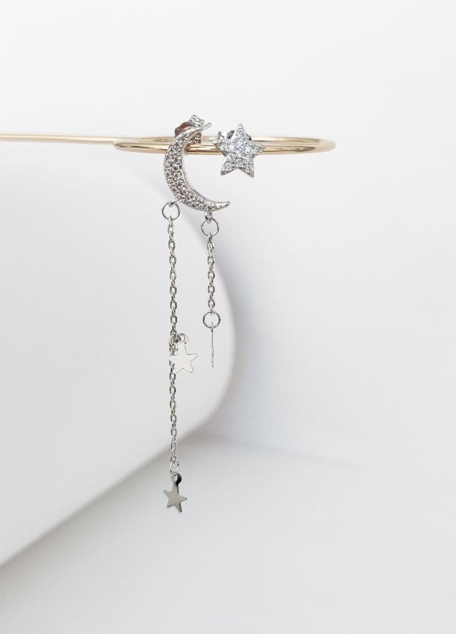 Жіночі сережки цвяшки висячі асиметричні місяць та зорі MK1113 срібний DeKolie (264077882)