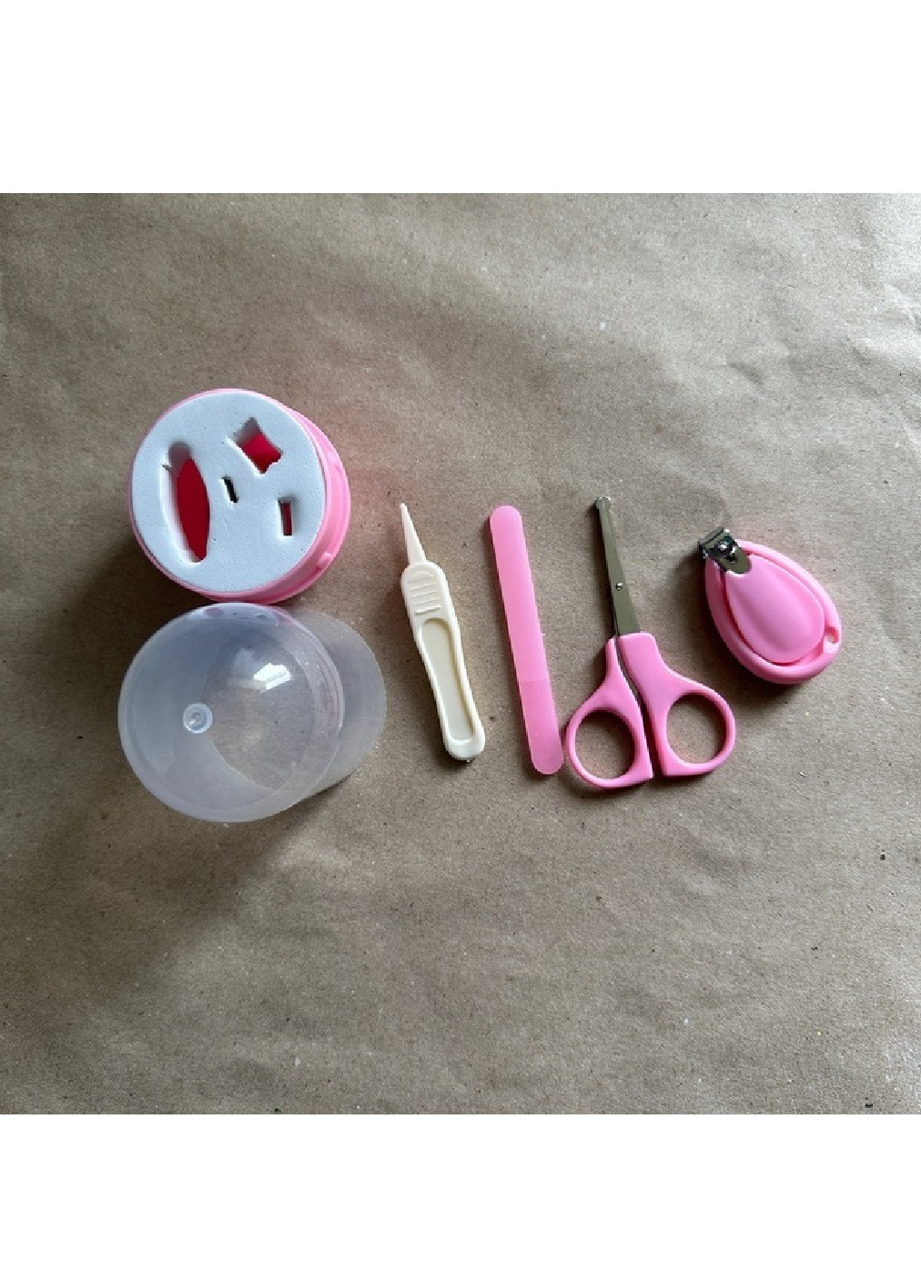 Детский маникюрный набор в прозрачном футляре капсуле с ножницами пинцетом пилочкой для детей малышей (475017-Prob) Розовый Unbranded (260668383)