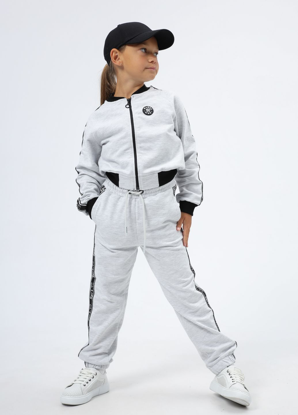 Спортивний костюм на дівчинку 8980 122 см Білий, чорний 67100 Wanex (260551918)