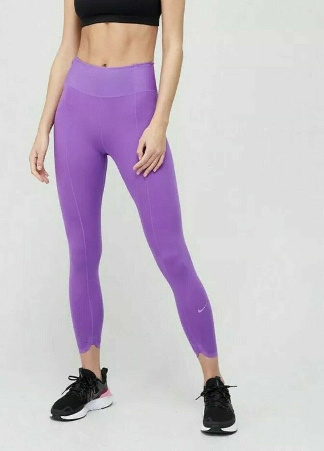 Фиолетовые леггинсы Nike