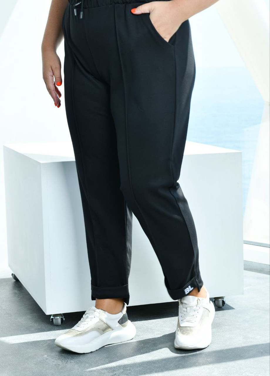 Жіночі брюки чорного кольору р.48 376002 New Trend (259214505)
