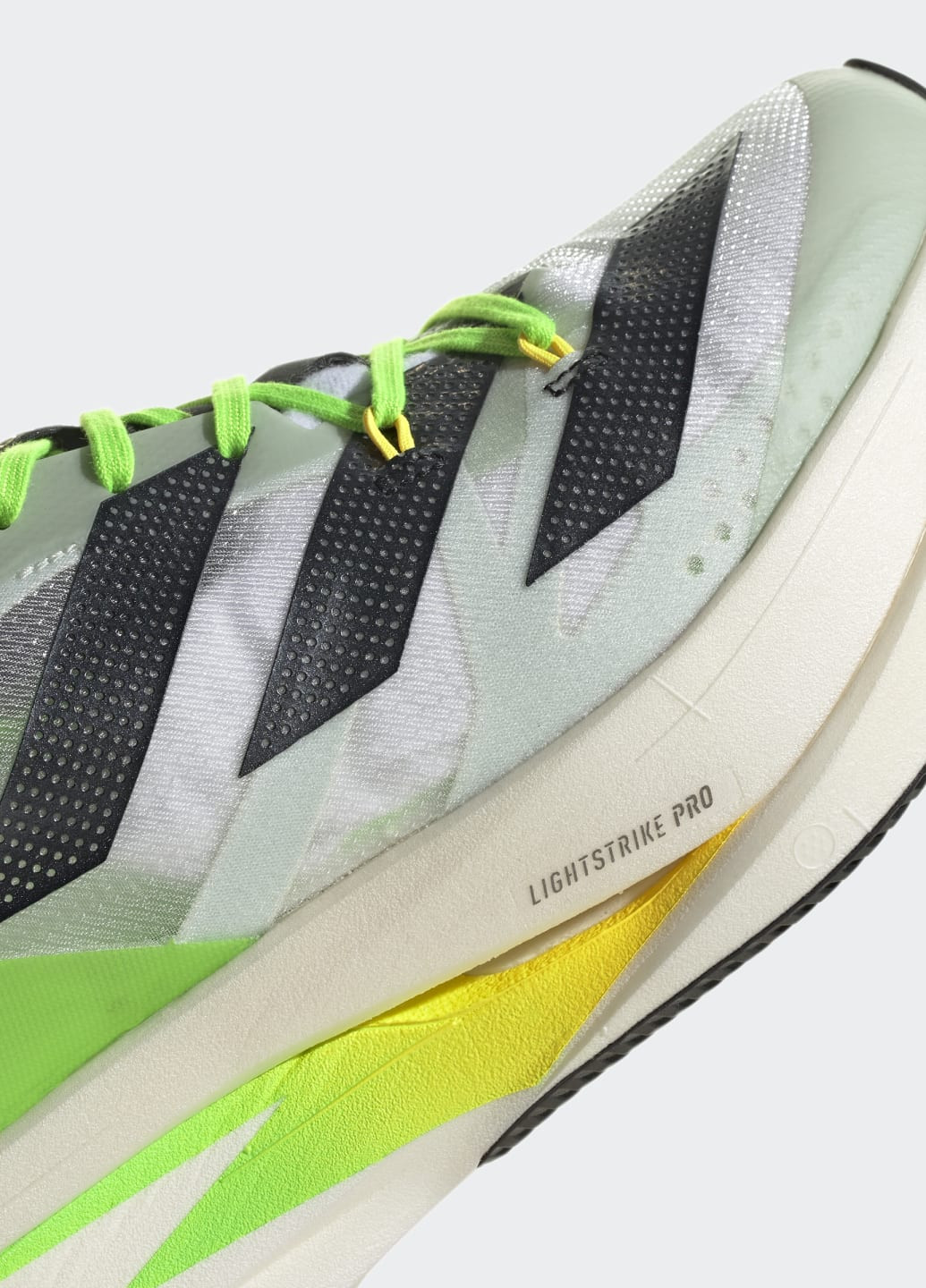 Зелені всесезонні кросівки для бігу adizero prime x adidas