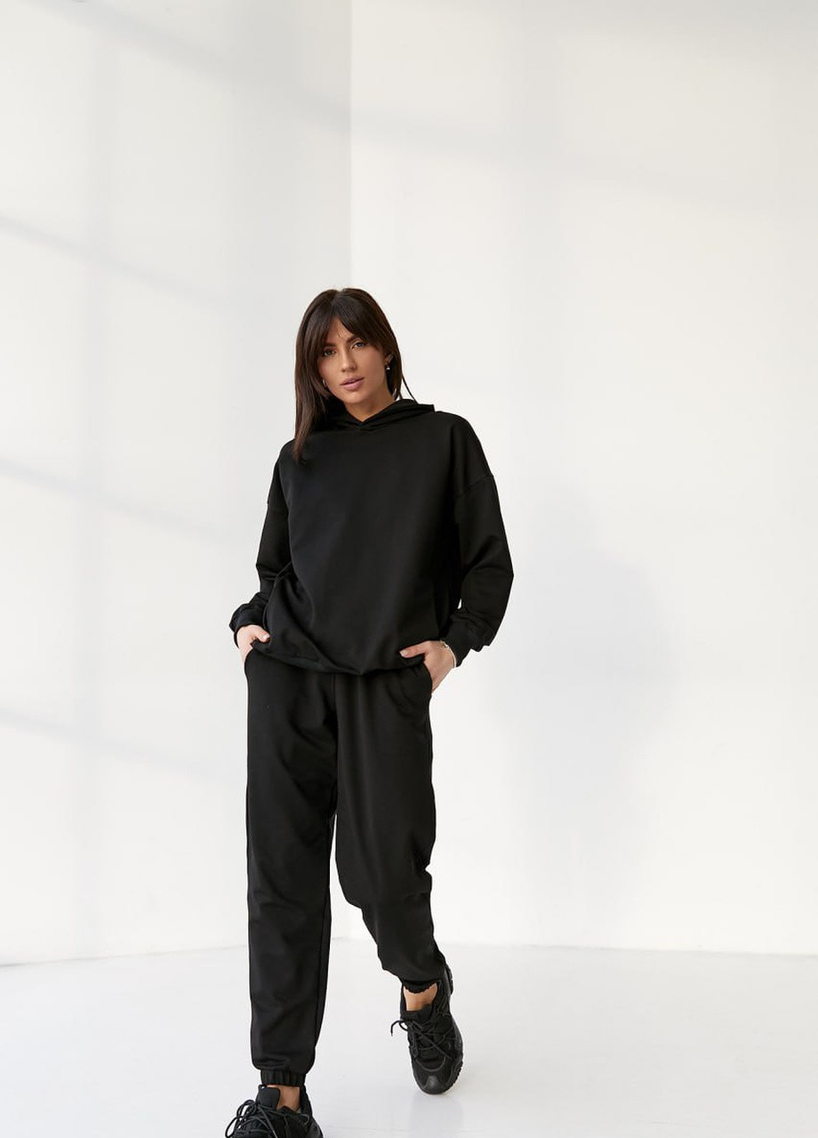 Жіночий костюм худі+джогери колір чорний р.L 421091 New Trend (258706211)