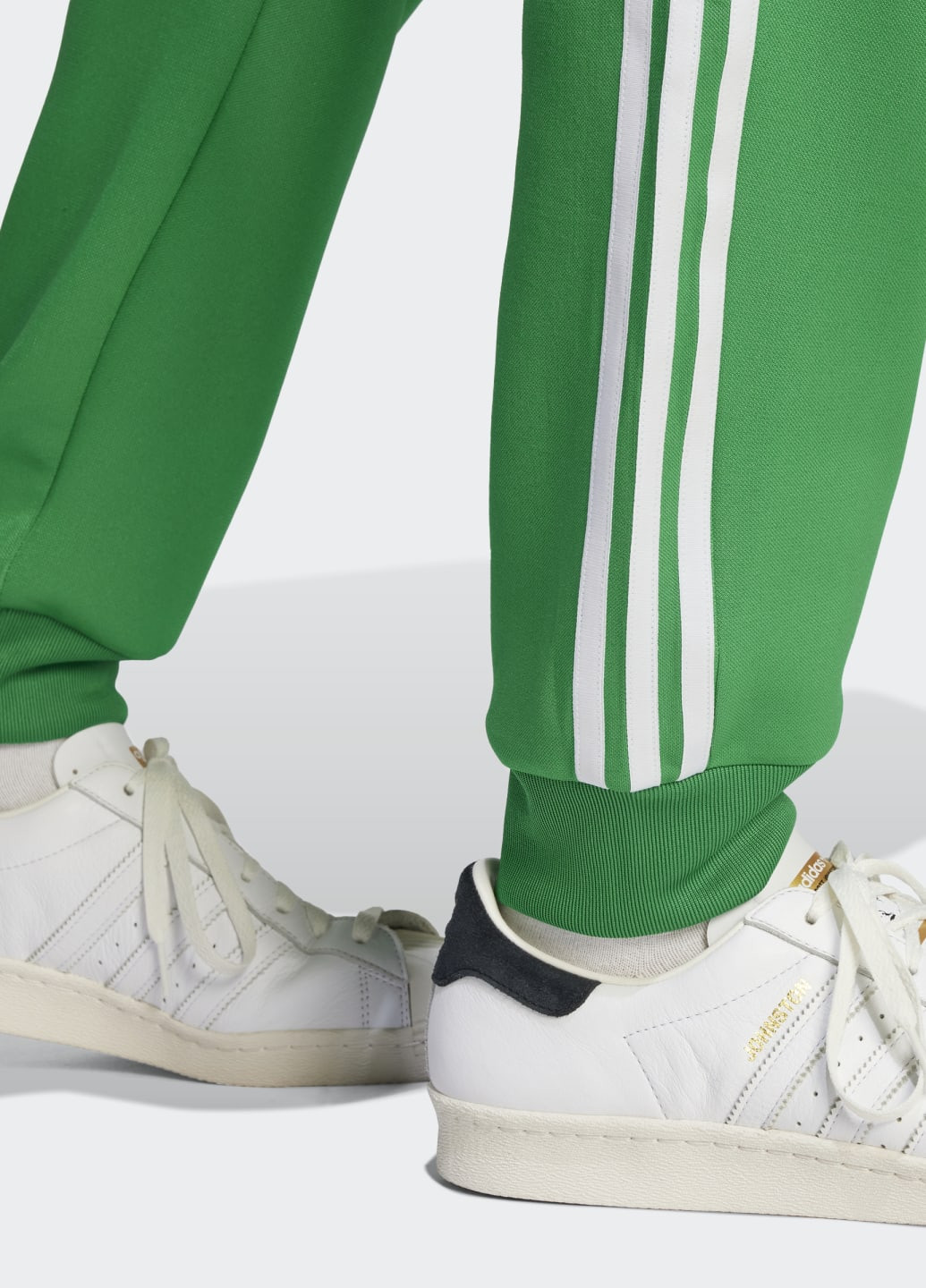 Зеленые спортивные демисезонные брюки adidas