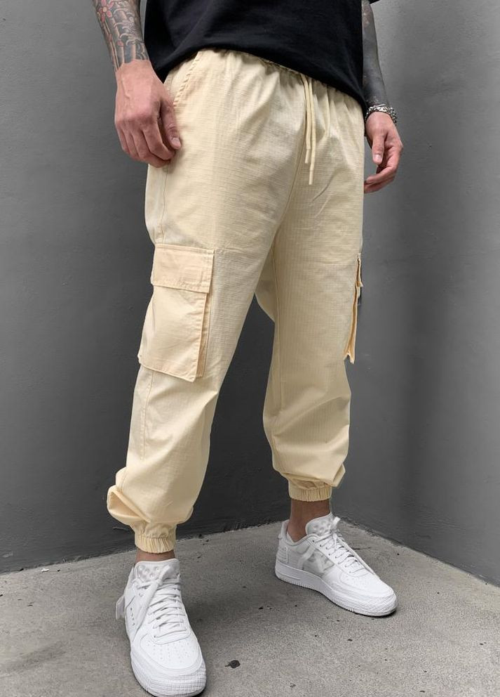 Жовті чоловічі джинси карго на манжетах No Brand (262088982)