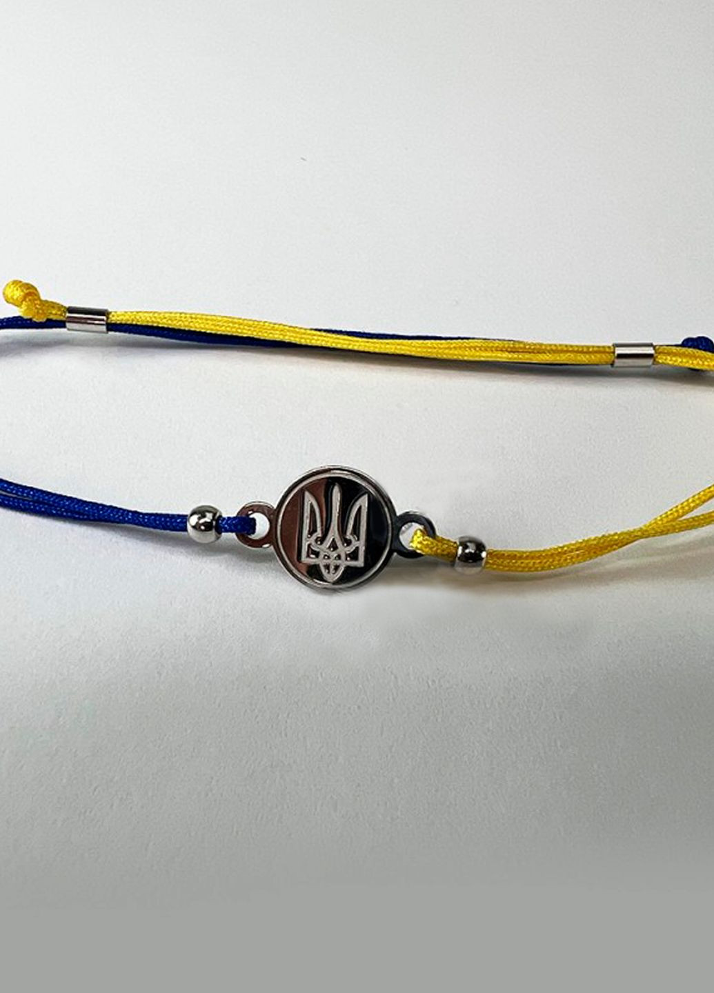 Серебряный браслет Герб с подвеской «Трезубец» жёлто синий регулируется Family Tree Jewelry Line (266042186)