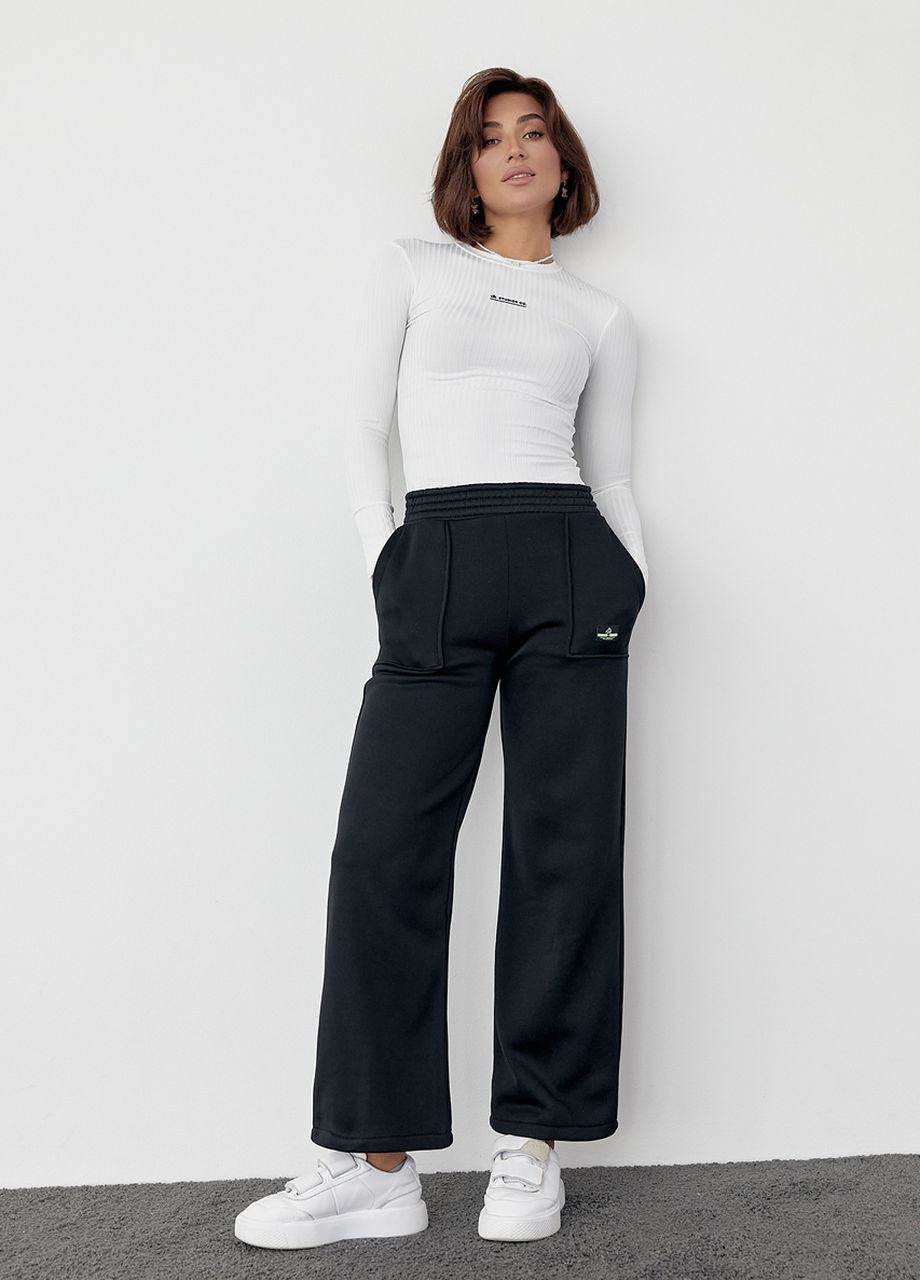 Трикотажні штани на флісі з накладними кишенями Lurex (266555801)