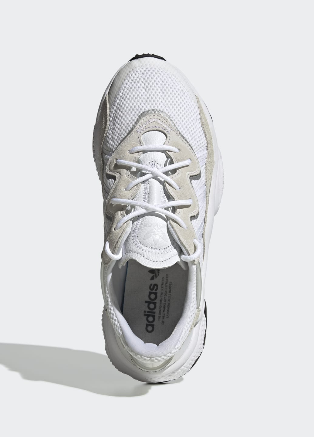 Белые всесезонные кроссовки ozweego adidas