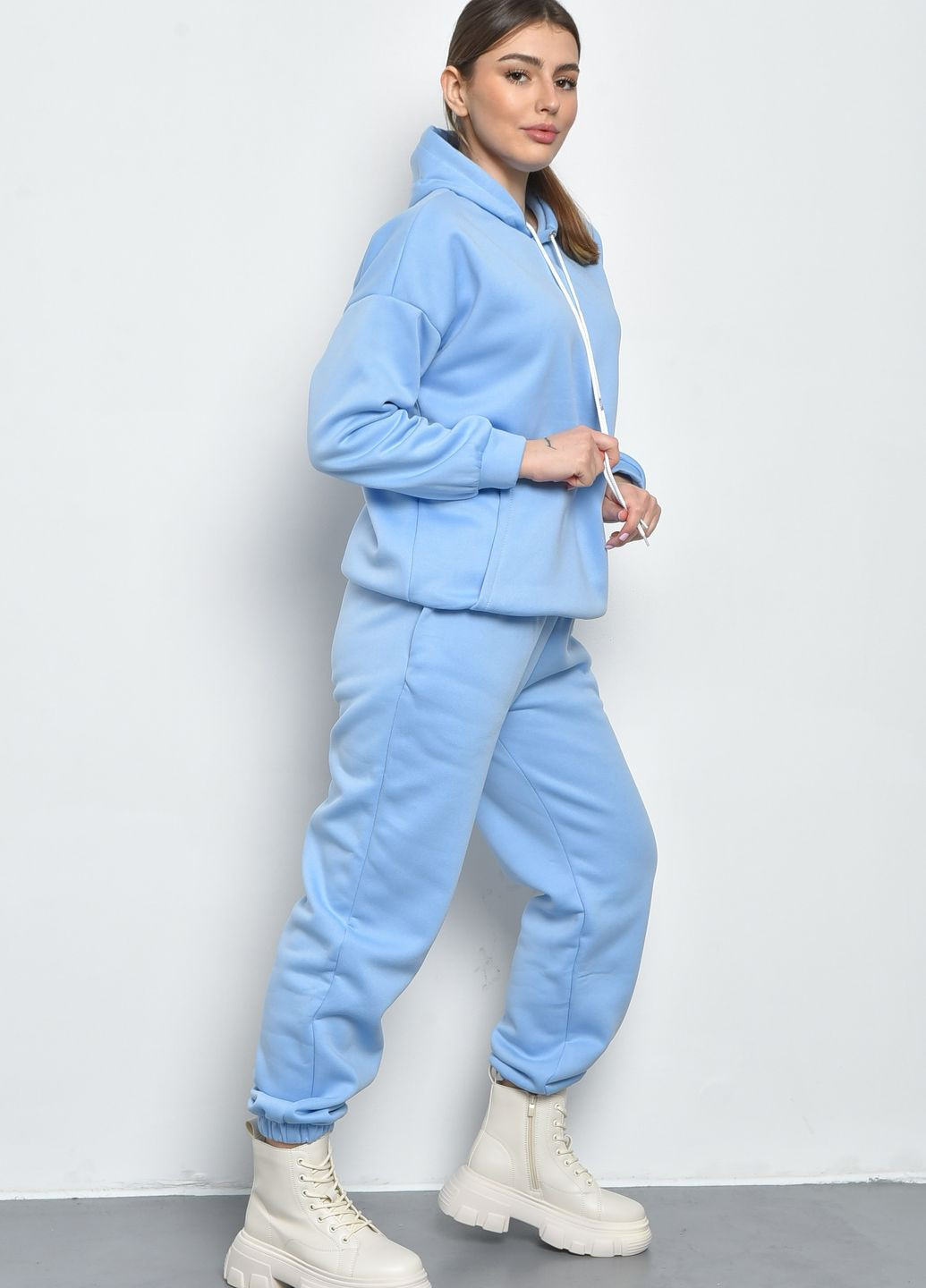 Спортивний костюм жіночий на флісі блакитного кольору Let's Shop (271813387)