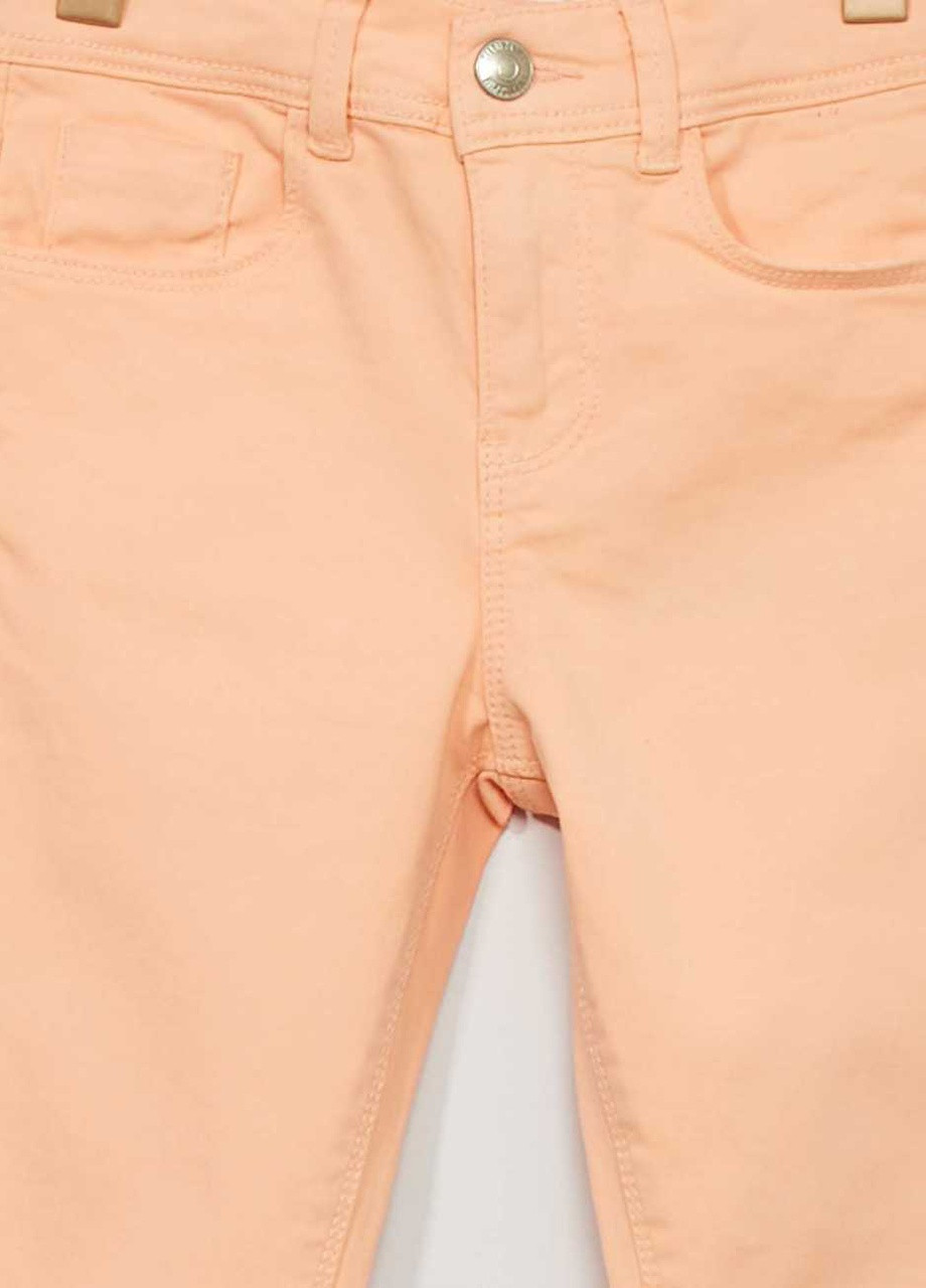 Персиковые брюки Kiabi