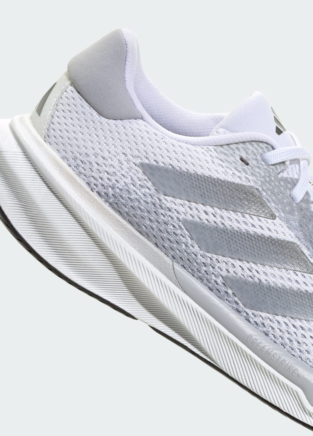Білі всесезонні кросівки supernova stride adidas