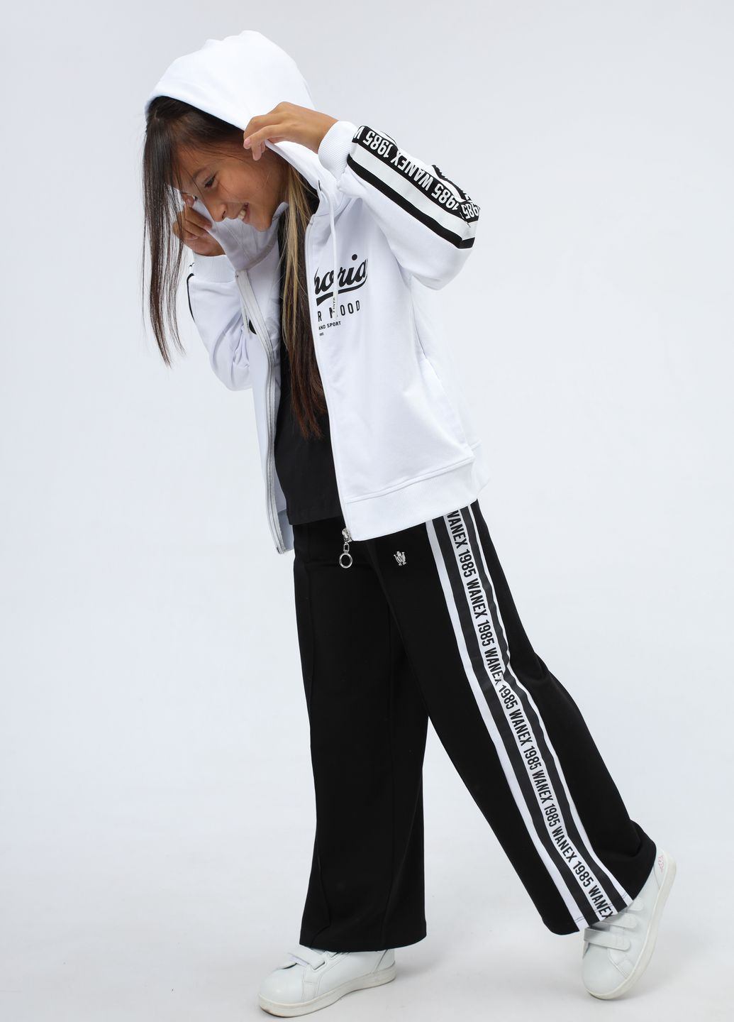 Спортивний костюм на дівчинку 8978 128 см Чорний, білий 67089 Wanex (260551920)