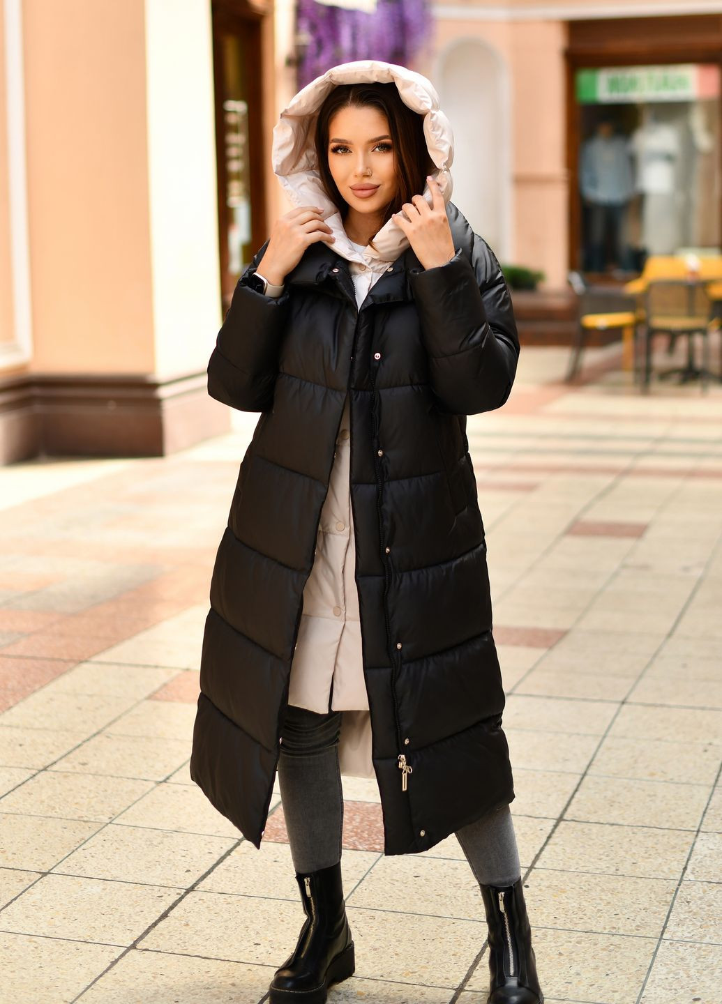 Чорне зимнє Довге жіноче пальто чорне з молочним 89942 трансформер Svidni