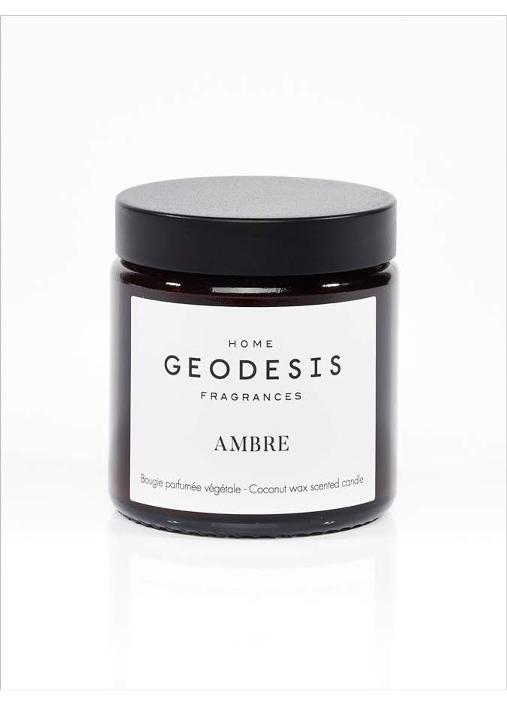 Ароматична свічка з ароматом йодованої амбри Amber 90 г Geodesis (258334032)