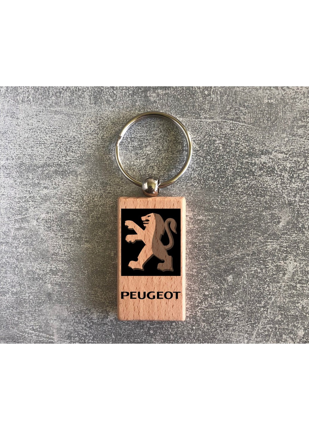 Дерев'яний брелок з логотипом Peugeot (15010102011) ЗаСвіт (261255792)