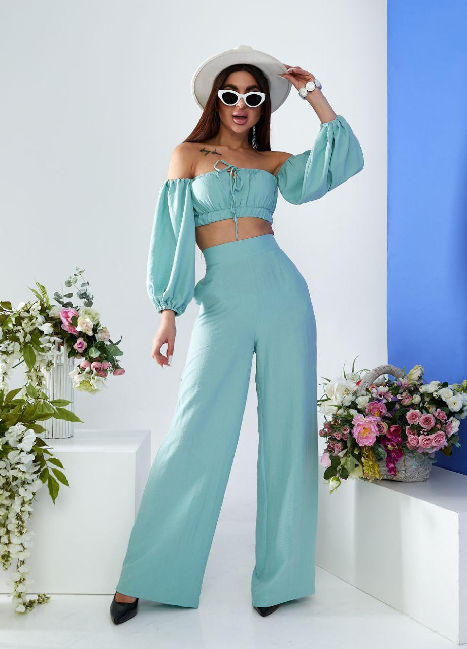 Жіночий костюм топ і штани палаццо оливкового кольору 387262 New Trend (257627575)