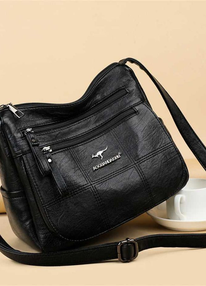 Вместительная сумка из искусственной кожи с большим количеством отделений черная Valiria Fashion (276254573)