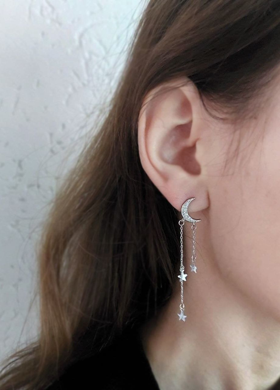 Жіночі сережки цвяшки висячі асиметричні місяць та зорі MK1113 срібний DeKolie (264077882)