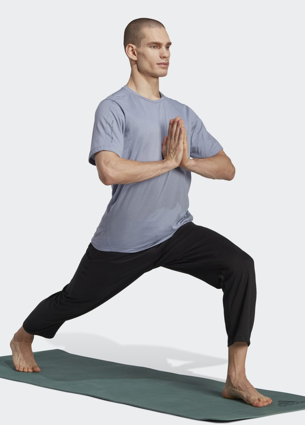 Фіолетова футболка yoga base training adidas