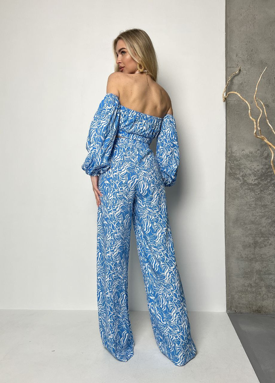 Жіночий костюм топ і штани колір блакитний р.L 435095 New Trend (259185942)