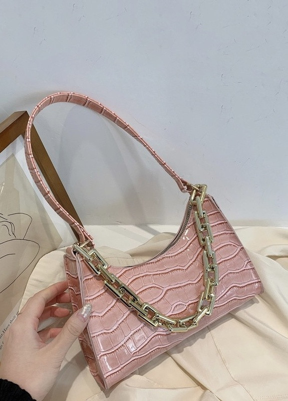 Жіноча маленька сумка рептилія багет крокодиляча шкіра з ланцюжком рожева No Brand (259473648)