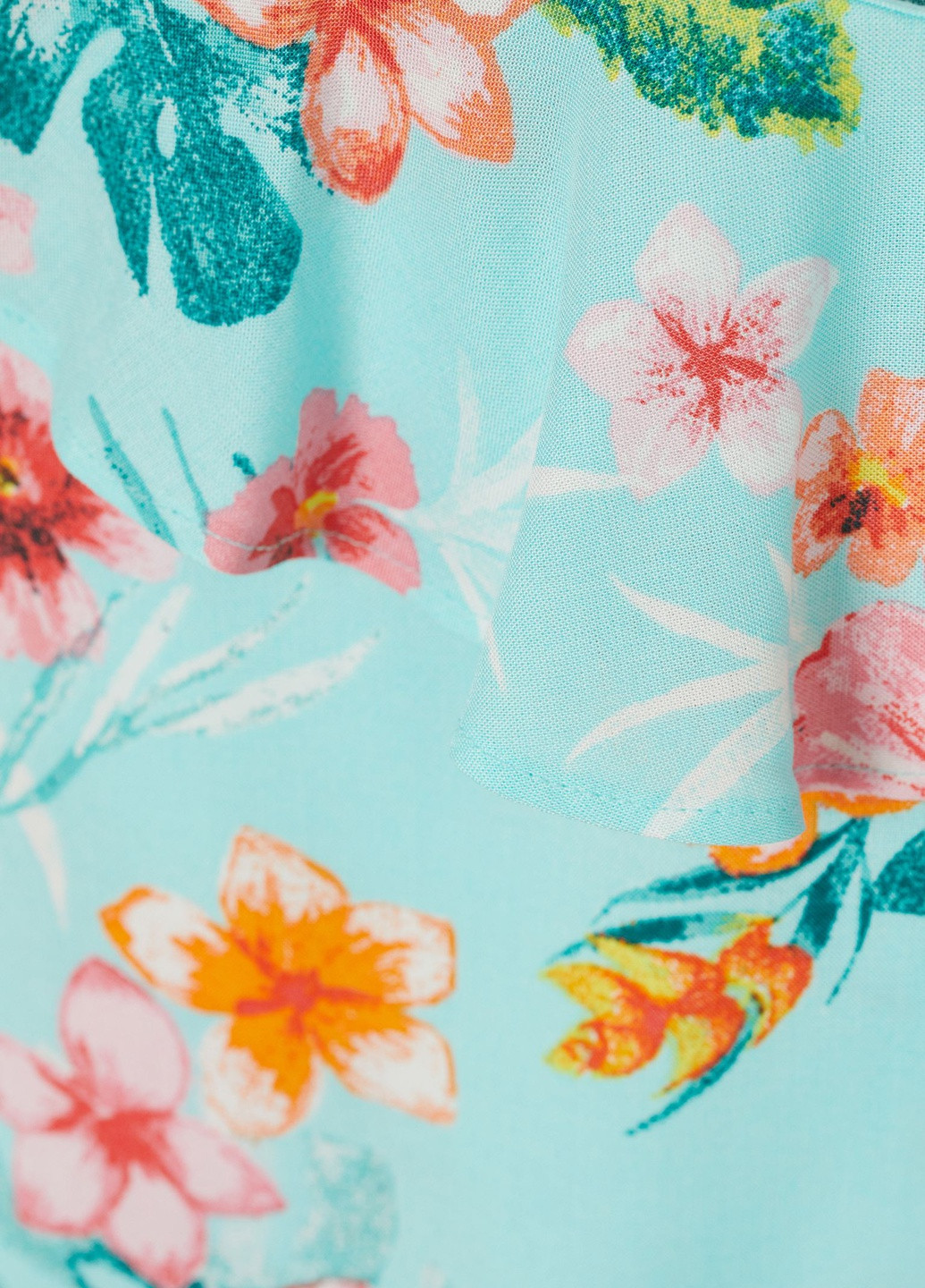 Бирюзовая цветочной расцветки блузка H&M летняя