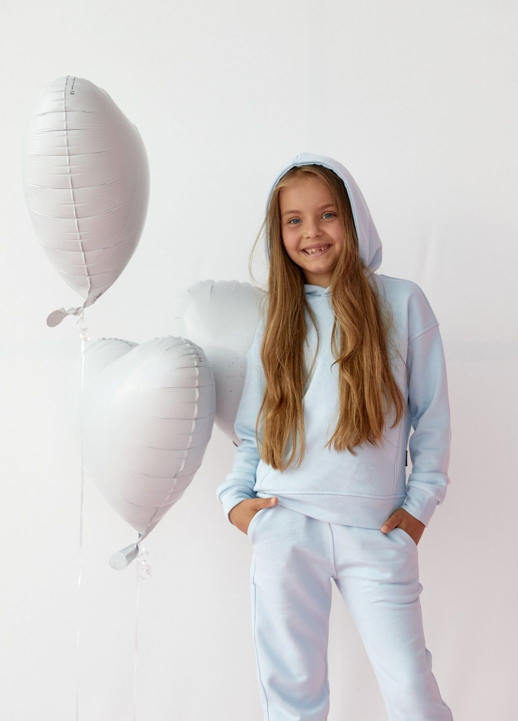 Дитячий костюм худі та джогери для дівчинки колір світло блакитний р.128 438428 New Trend (260267924)