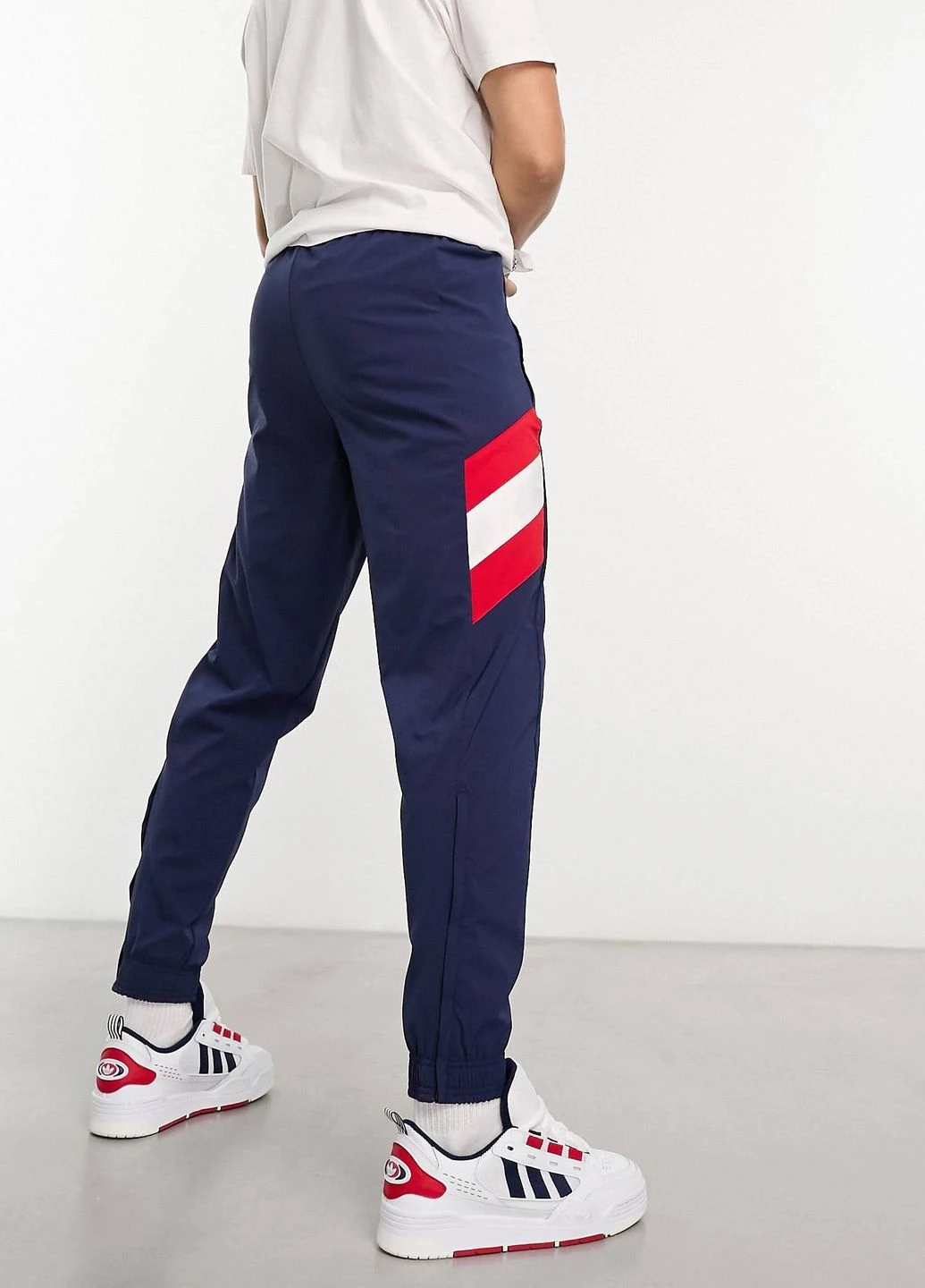 Синие спортивные демисезонные зауженные брюки adidas