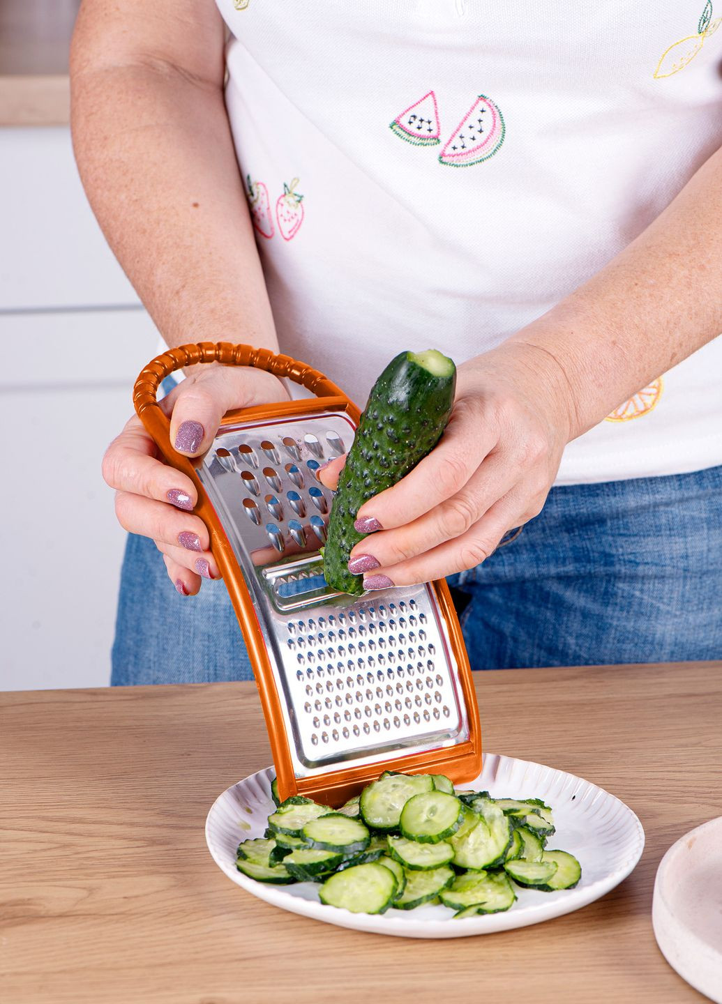 Тертка шатківниця слайсер для овочів і фруктів із неіржавкої сталі з ручкою та пластиковим обідком 3 в 1 Жовтогарячий Kitchette (265300377)