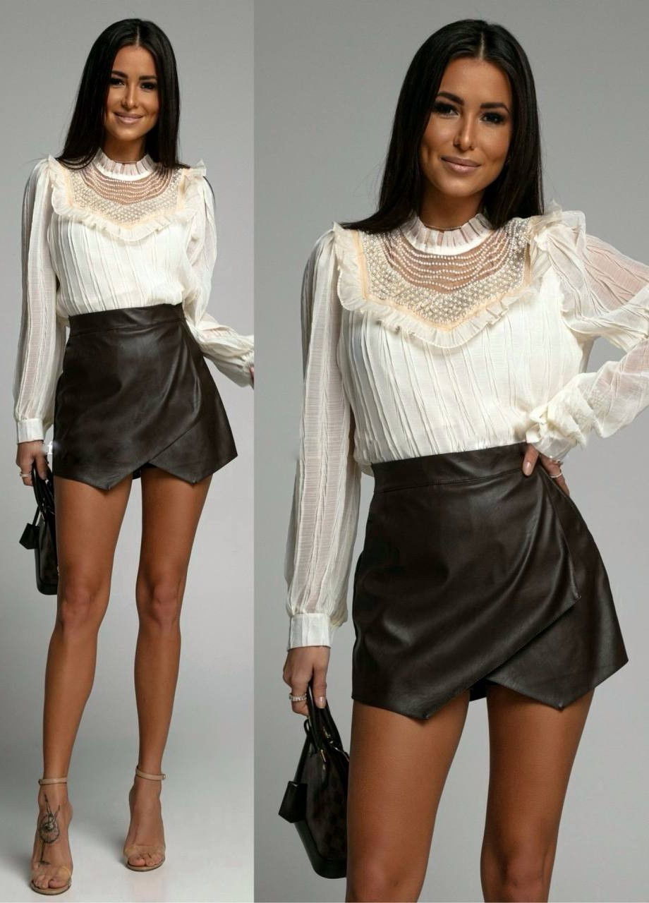 Черное женская юбка-шорты из эко-кожи черного цвета 396638 New Trend