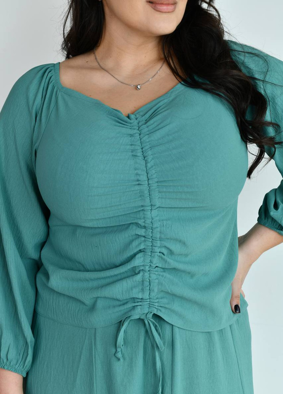 Зелена костюм жіночий блуза та спідниця кольору оливка р.50/52 431387 New Trend