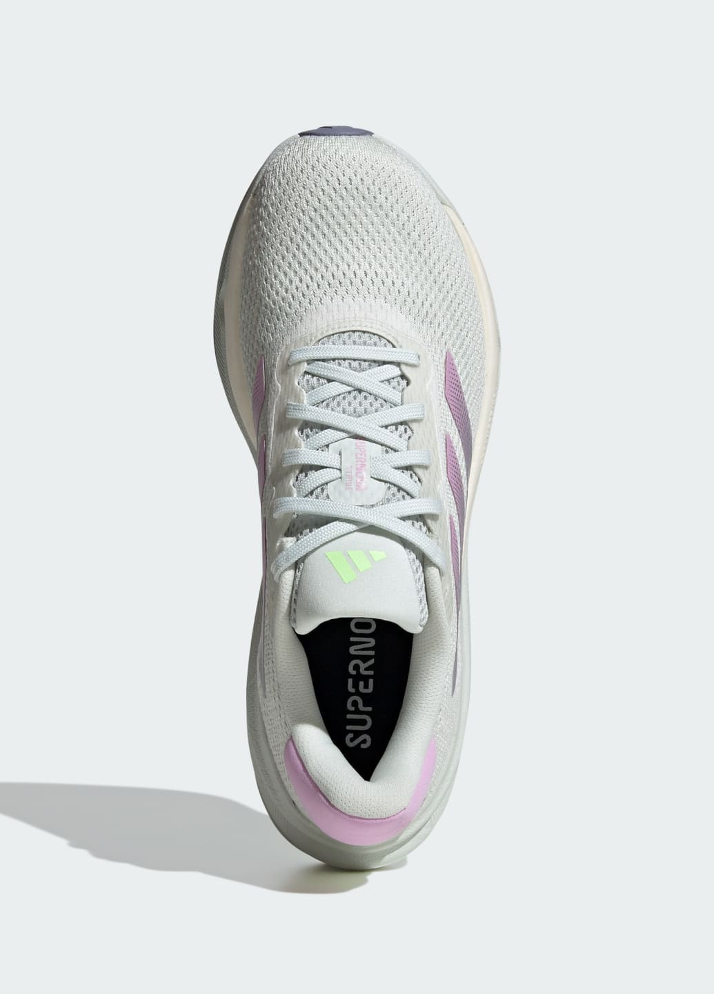 Зелені всесезонні кросівки supernova stride adidas