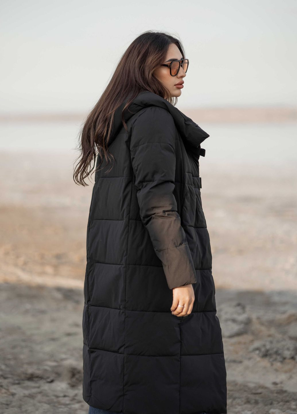 Чорне зимнє Довге жіноче зимове пальто 639382 Towmy