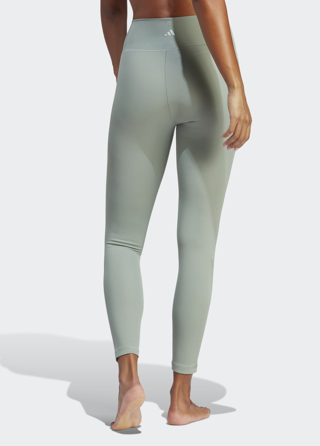 Зеленые демисезонные леггинсы yoga studio luxe 7/8 adidas