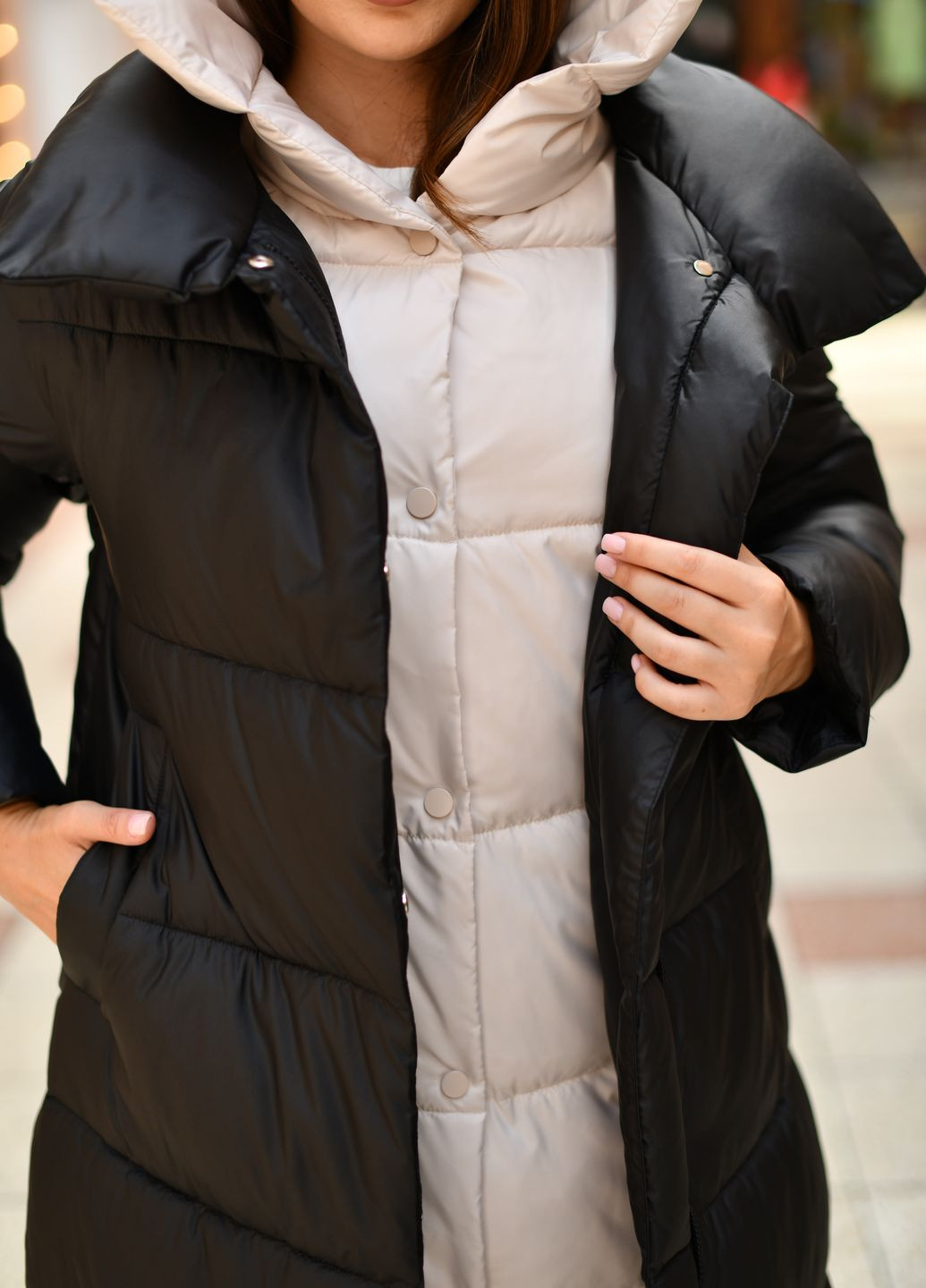 Чорне зимнє Довге жіноче пальто чорне з молочним 89942 трансформер Svidni