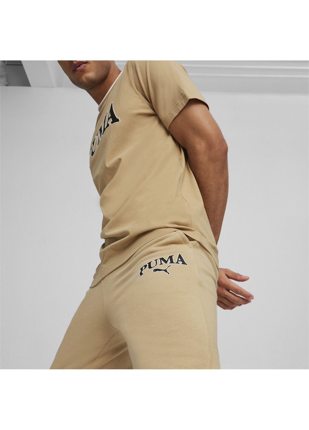 Бежевые спортивные демисезонные брюки Puma
