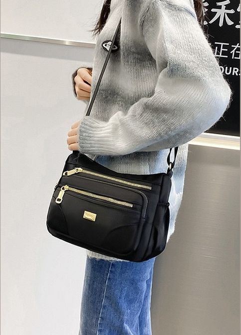 Жіноча сумка крос-боді чорна No Brand (292631164)