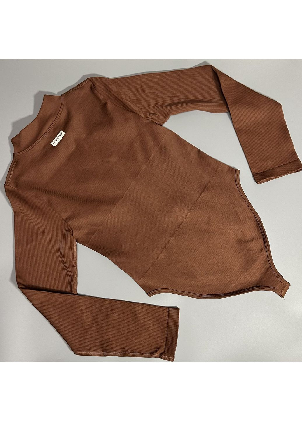 Жіноче спортивне боді з довгим рукавом у рубчик No Brand (354830598)