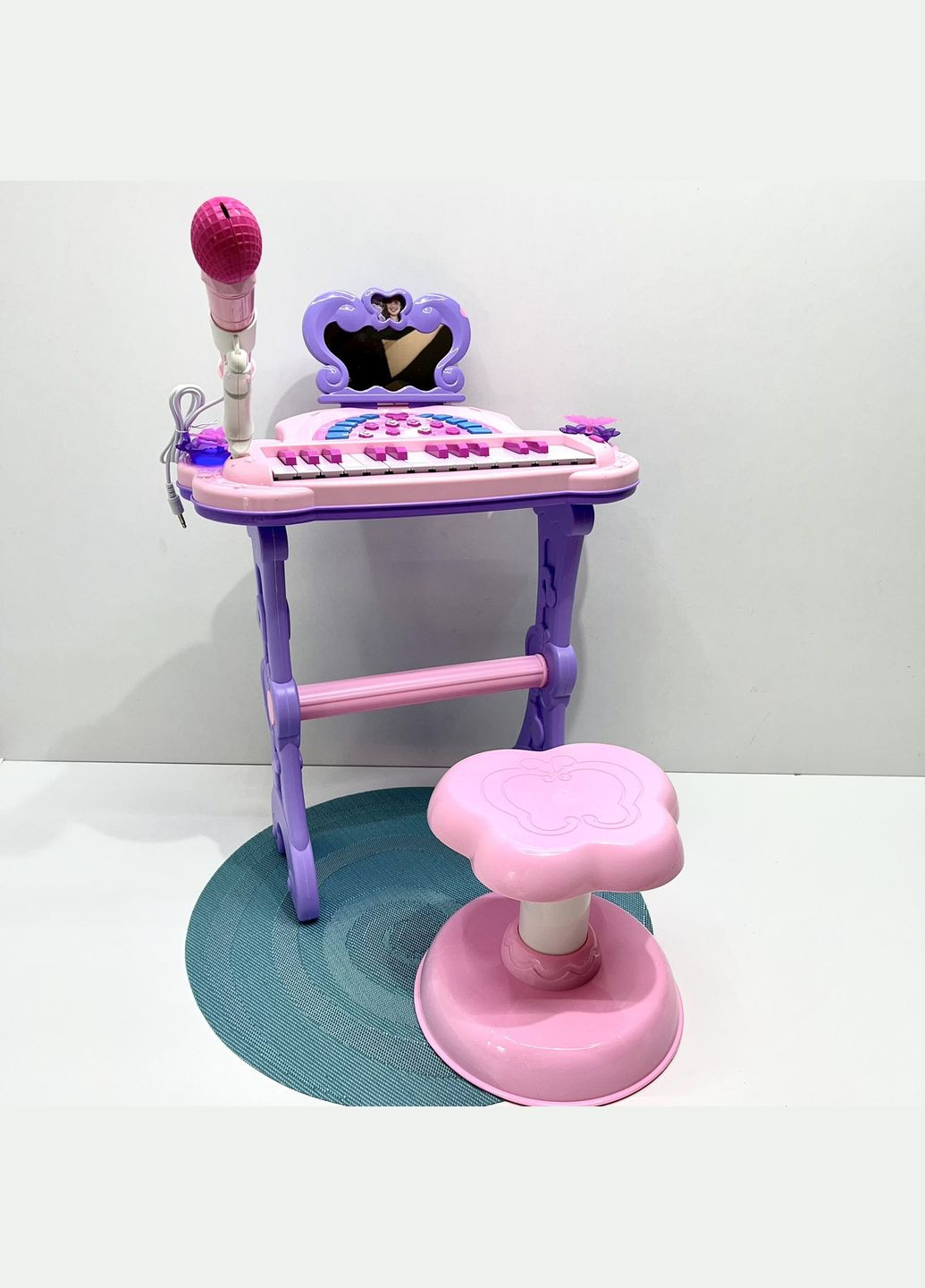 Піаніно синтезатор музичний зі стільчиком 25 клавіш з MP3 мікрофоном та регулятором гучності Рожевий (J92-01) No Brand (303137341)