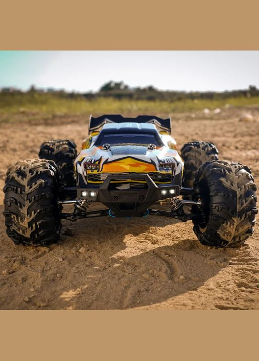 Радиоуправляемая машина Conquer монстр-трак 4х4 70км/ч 1/16 Оранжевый (код: 16101PROJ) WL Toys (325449367)