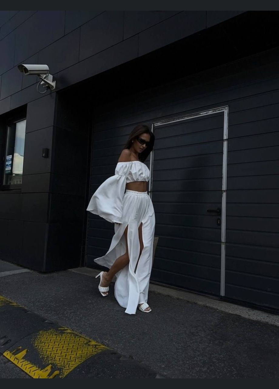 Вишуканий жіночий костюм з топом та штанами Adelante (339606110)