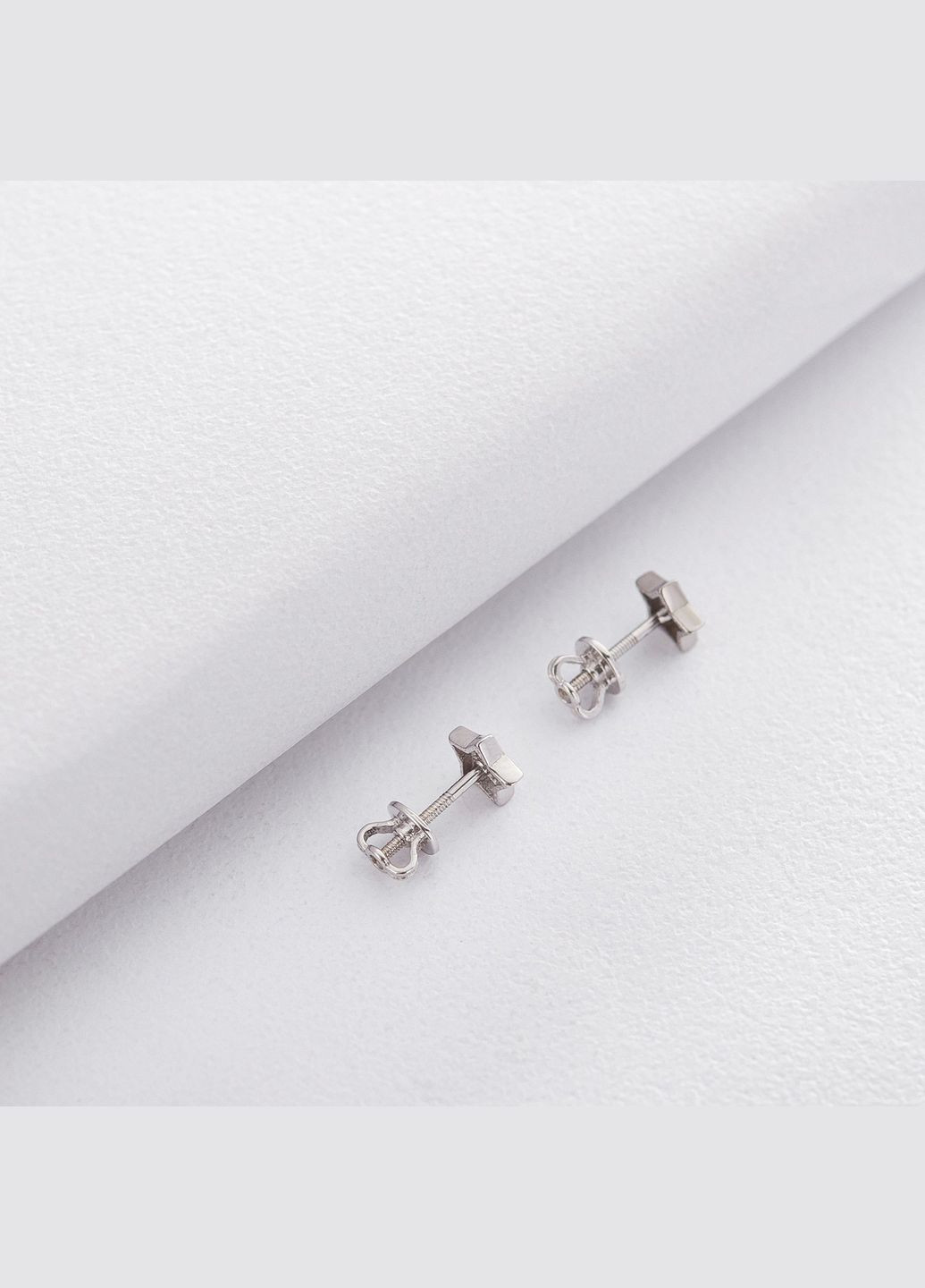 Золоті сережки-гвоздики з зірочками с06184 Oniks (264022659)