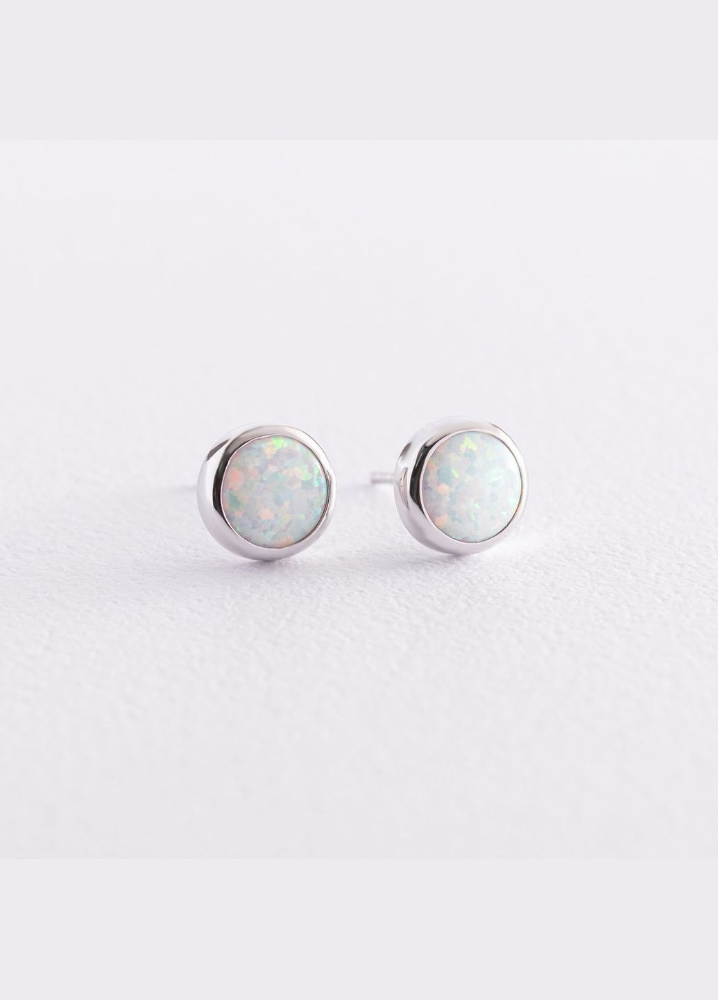 Золоті сережки-пусети Сяйво (синт. опал) 8 мм с07435 Oniks (264024080)