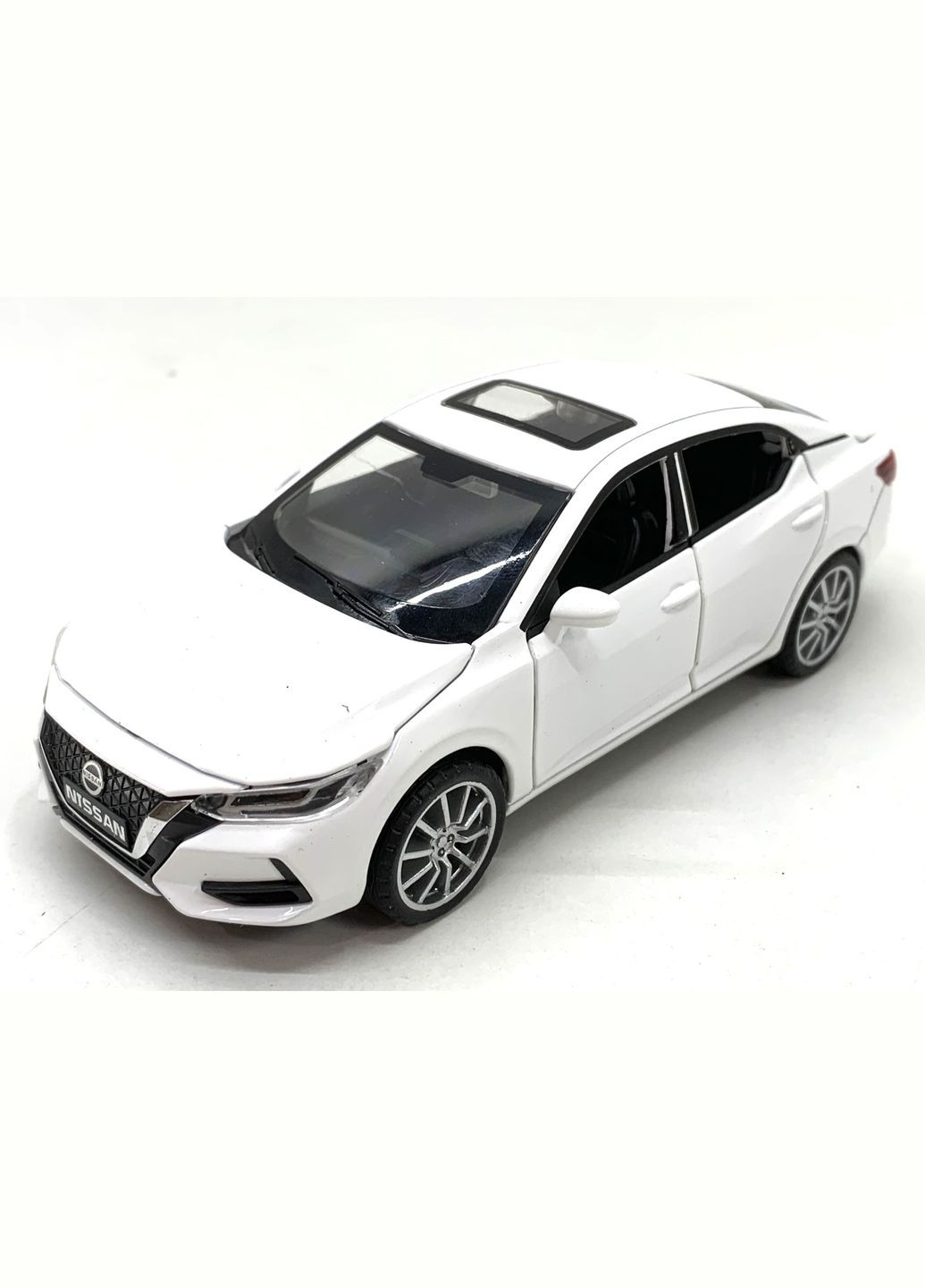 Машина Автосвіт Nissan selfie інерційна масштаб 1:32 відчиняються двері капот багажник 15 см Біла (AP-2084) No Brand (302215654)