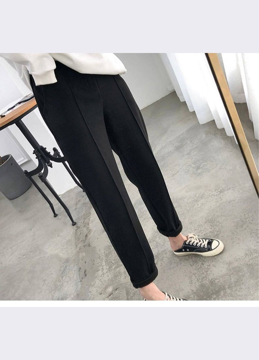 Жіночі штани вільного крою колір чорний р.50/52 450170 New Trend (282928016)