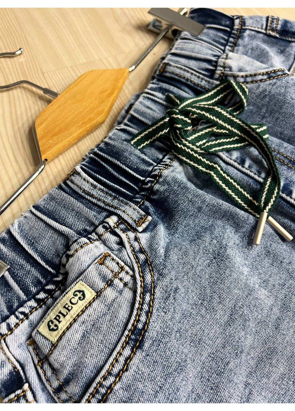 Спідниця жіноча джинсова ZJY 67501 талія на резинці зі шнурком нижче коліна розріз позаду блакитна No Brand (322948911)