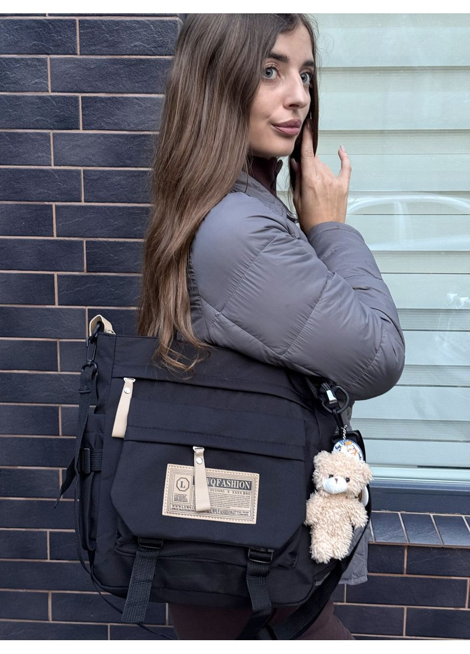 Сумка через плечо молодежная, школьная нейлоновая сумка со значками и черным брелком. Сумка мессенджер. No Brand (367581578)