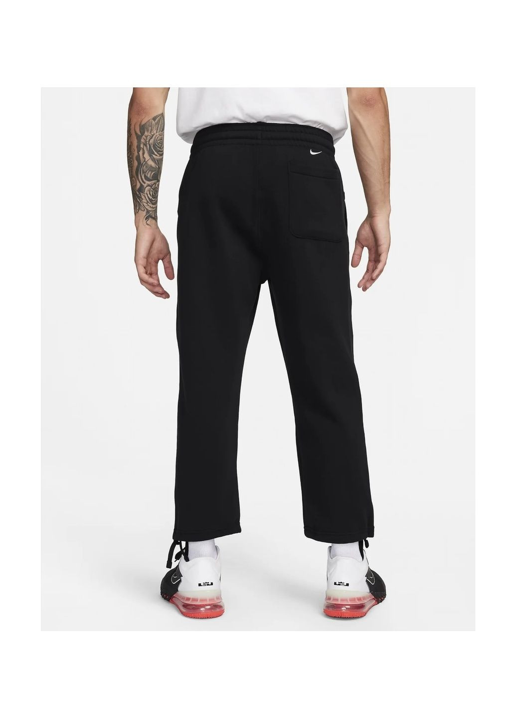 Черные демисезонные брюки Nike